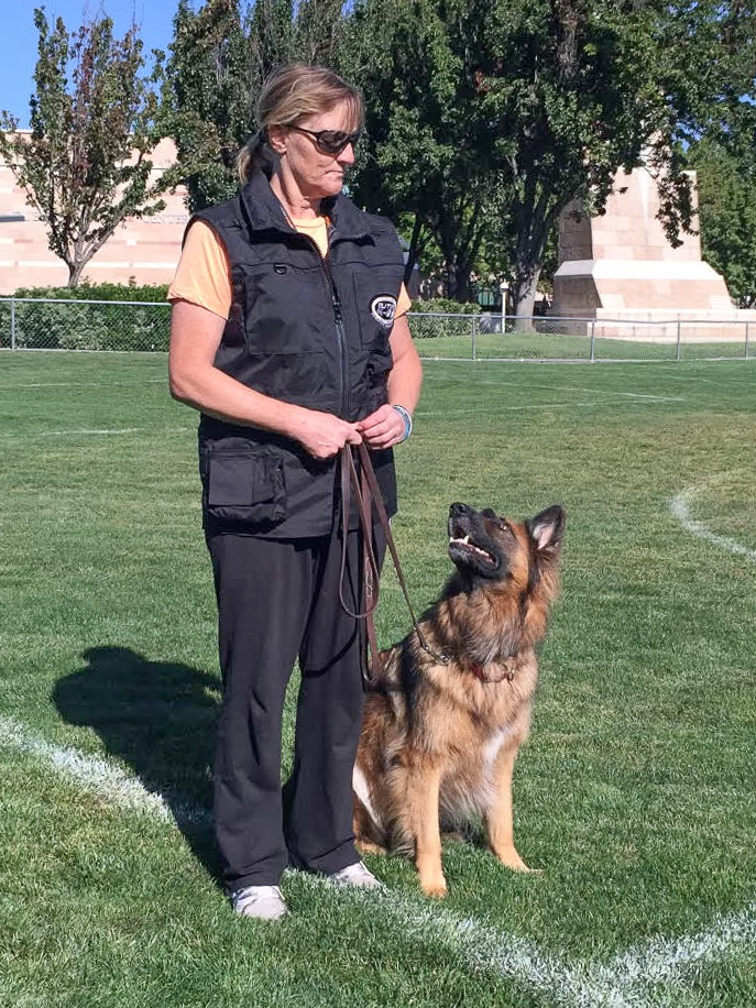 Suzanne with Hank practicing obedience